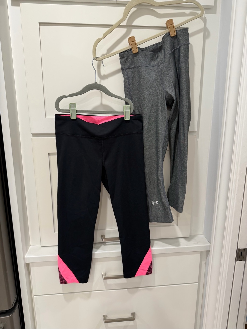 Under Armour Black Leggings with Pink Accents and also Gray Pair